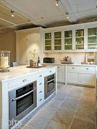 Black oven in the kitchen for me, please? Kitchen Http Kitchenstuffscollections Blogspot Com Double Oven Kitchen Kitchen Layout Kitchen Design