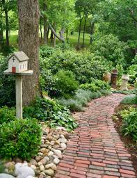 River rock is available in a number of different sizes ranging from ½ all the way up to 6 and greater. 3 29 18 Garden Art River Rock And Antique Brick Pavers Draw Attention Neil Sperry S Gardens