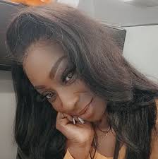 What causes black spots in hard-boiled eggs from backyard chickens?