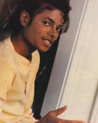 Michael Jackson reading The Maxfield Parrish Poster Book with his sister  LaToya at their home Hayvenhurst in Encino, California,...