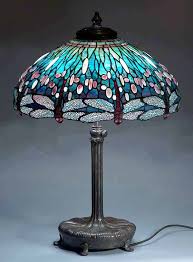 A tiffany lamp is a type of lamp with a glass shade made with glass designed by louis comfort tiffany and his design studio. 170 Lighting Design Ideas Lighting Lighting Design Design