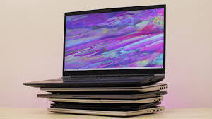 A stack of new laptops