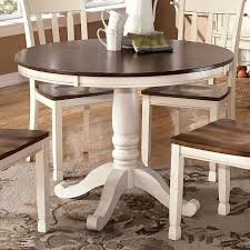 Made with mindi veneer and select hardwood solids in a contemporary weathered gray finish. Whitesburg Round Dining Table Signature Design By Ashley Furniture Furniturepick