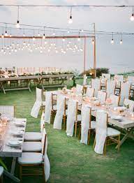 Romantic Cliff Top Wedding By The Sea In Bali Outdoor Wedding Wedding Reception Lighting Bali Wedding