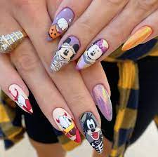 Nailed It These 35 Halloween Art Design Ideas Are Seriously Spellbinding Disney Halloween Nails Halloween Acrylic Nails Halloween Nail Designs