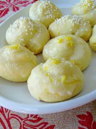 Carefully transfer the cookies to the lined baking sheets, laying them with a bit of space. Anginetti Italian Lemon Knot Cookies Recipe Lemon Drop Cookies Italian Christmas Cookies Italian Cookies