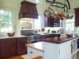 This custom built island done by valley custom cabinets is a beautiful piece of work that makes for a focal point in this kitchen. Farmhouse Kitchen Design Pa Morris Black Designs