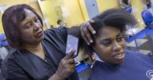 Woman enrolls in her own beauty school