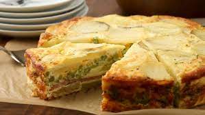 This Simple Dish Is Basically A Crustless Quiche Serve It Hot Cold Or At Room Temperature Martha Stewart Recipes Ham And Potato Recipes Recipes
