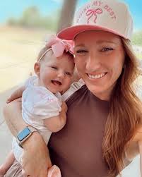 Doing my best 🎀 Can't believe we are about to have a SIX month old  @lukekimmel 🥹 Peyton loves Mama's new hat from @shopboldlyblonde 💗