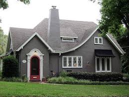 You want a gray siding that sits in the middle of the white and black. Charms House Grey Stucco Google Search White Trim Gray Stucco House Paint Exterior House Paint Exterior Grey Exterior House Colors