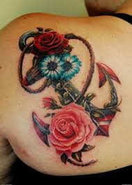 Dark shades of infinity tattoo on the arm of the two wearer's, with the name tyler and sabreena written on it. 60 Awesome Back Tattoo Ideas For Creative Juice