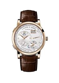 The A Lange Sohne Lange 1 Time Zone Edition In Honey Gold This Second Time Zone Timepiece Features A Luxury Watches For Men Watches For Men Luxury Watches