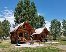 Deluxe Cabin Patios With A Mountain Touch At The Steamboat Springs Koa Steamboat Springs Cabin Camping Cabin Patio