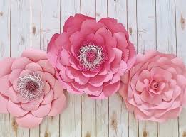 They can also be used as a display of love at funerals, as demonstrated at the funeral for anna nicole smith. Pink Paper Flowers Wall Decor Nursery Wall Flowers Pink Etsy Paper Flower Wall Decor Paper Flower Wall Paper Flowers