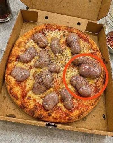 I ordered a pizza in the evening. The delivery. driver brought it to me. I  took it and went to the kitchen to eat. When I opened the box, I saw this.