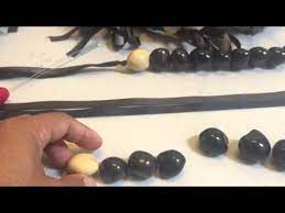 How To Make A Kukui Nut Lei Faster And Easier Youtube Kukui Nut Money Lei Kukui