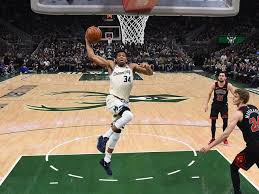 Youtu.be/cy1jn these 3 photos of jaylen brown dunking on giannis antetokounmpo are incredible. Giannis Eclipses 10k Points As Bucks Defeat Bulls Thescore Com