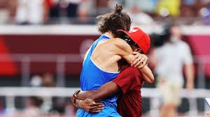 Gianmarco tamberi, left, leaps into the arms of friend and rival mutaz essa barshim after they agree to share gold in the men's high jump at tokyo olympic stadium on sunday. Lsqw0j8agfkz M