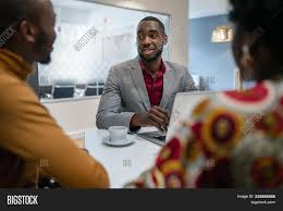 For a bank with a financial advisor arm. African Couple Meeting Image Photo Free Trial Bigstock