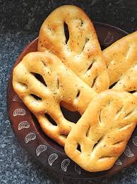 In french cuisine, fougasse is a type of bread typically associated with provence but found (with variations) in other regions. How To Make Fougasse The French Cousin Of Italian Focaccia Elizabeth S Kitchen Diary