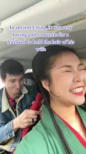 Chinese Woman Yanks Husband's Hair for Looking