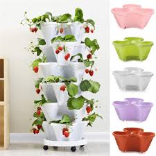 Strawberry tower planter help save space and substantially beautify any balcony, home, or public area in which they are placed. Vertical Garden Planters Self Watering Tower Ideal Home Decoration 6 Layer 3 Dimensional Plastic Flower Pot Beige Cwtt Stackable Strawberry And Herb Stand With Wheels Gardening Patio Lawn Garden Biquinismaranata Com Br