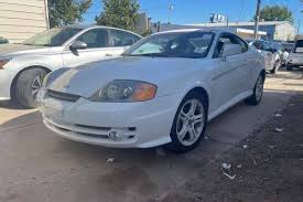 Image result for Bright Silver 2000 Tiburon