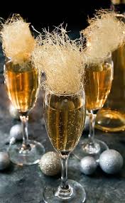 31 Cocktails For A Fabulous New Year S Eve Our Best Life Candy Cocktails Champagne Cocktail New Year S Eve Cocktails