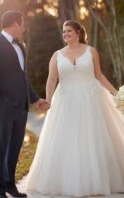 This collection was inspired by a love story of our very own, and these soft floral Modest A Line Plus Size Wedding Dress Stella York Wedding Dresses