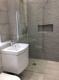 Grey Bathroom Neutral Bathroom Modern Bathroom Stone Effect Tiles Recessed Shelf White Gloss Bathroom Furniture Modern Bathroom Wet Rooms Wet Room Shower