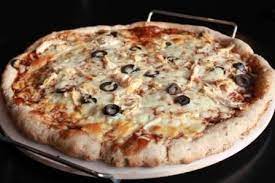 Team Traeger Wood Fired Pizza With The Traeger Pizza Stone Traeger Cooking Smoked Food Recipes Recipes