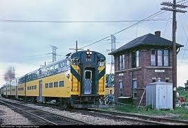 A Cnw Scoot Commuter Train Rolls Through Deval Tower Which Protects Cnw And Soo Line S Crossing On T Railroad Photography Union Pacific Railroad Northwestern