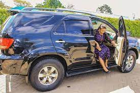 Rev.natasha shows her football skills. Hot City Pastor Lucy Natasha Presents Her New Car Photos