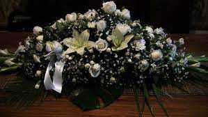 Bought a beautiful casket when her grandmother died a small casket of jewels. White Rose Lily And Baby S Breath Casket Flowers