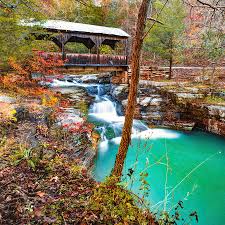 We selected this hike for our family because it is relatively short in length at 2.4 miles, and features several caves and waterfalls. Ponca Creek Falls And Pond And Covered Bridge Boxley Valley Arkansas Photograph By Gregory Ballos