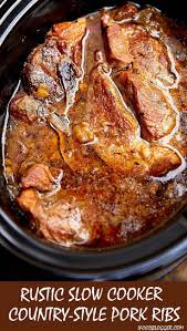 These Slow Cooker Country Style Ribs Melt In Your Mouth Tender Exceptionally Flavorful With Subt Crockpot Ribs Recipes Pork Rib Recipes Slow Cooker Pork Ribs