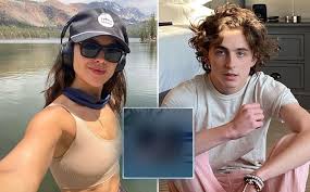 Nothing says summer like a new celebrity couple. Timothee Chalamet Papped With Bare A S During Steamy Pda Session With Eiza Gonzalez Watch