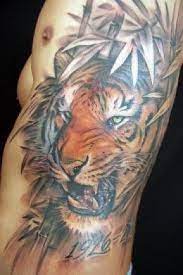 Tiger Tattoo Designs Ideas And Meanings Jungle Tattoo Tiger Tattoo Tattoos On Side Ribs