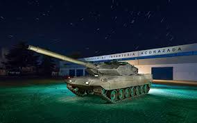 download wallpapers leopard 2 german battle tank garage army modern armored vehicles besthqwallpapers com veiculos blindados tanques exercito