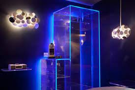 This Psychedelic Cabinet Is Clear Glass Or Plastic Walls Backlit By Blue Rope Light Genius Tie Dye Room Decor Tie Dye Room Rope Lights