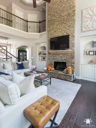 When it comes to using blue and yellow in the living room, white always seems to become. Navy And Orange Fall Living Room Decor Kelley Nan