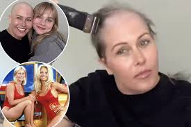 Baywatch' alum Nicole Eggert, 52, shaves head as she fights 'horrifying'  breast cancer