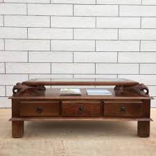 The coffee table offers importance things in your house. The Home Dekor Asgil Glass Top Handcarved Elephant Design Solid Mango Wood Coffee Table For Living Room Brown Natural Wood Solid Wood Coffee Table Price In India Buy The Home Dekor