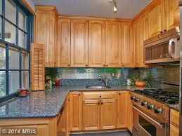 Blue Pearl Granite Countertops Pictures Cost Pros And Cons Honey Oak Cabinets Blue Countertops Blue Pearl Granite