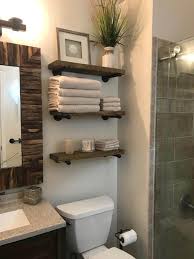 A folding shelf is a perfect solution for small bathrooms that lack in counter or vanity space. 45 Best Over The Toilet Storage Ideas And Designs For 2021
