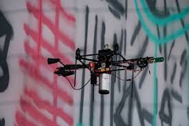 Drones Make A Splash Spray Painting Crowdsourced Graffiti Cnet