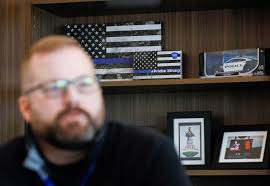 Paralyzed Springfield police officer Mark Priebe working in Republic