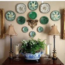 A plate wall is a fun alternative to the traditional gallery wall. Green Portugal Plates Wall Design Plates On Wall Plate Wall Decor Decor