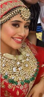 Shivani Joshi Bridal Set With Mangtika Exclusive Set of Kundan +Emerald For  booking plz whatsApp@+917008344191